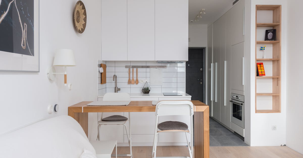 a cozy minimalist apartment interior with modern kitchen and living space